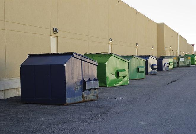 an aerial view of construction dumpsters placed on a large lot in Cleveland, MS